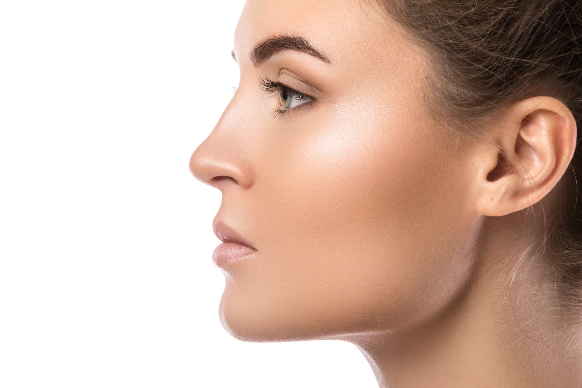 Portrait of beautiful young woman with clean fresh skin on white background